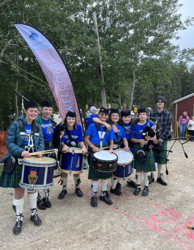 Pipe band youth at 2023 Bear Trap performance